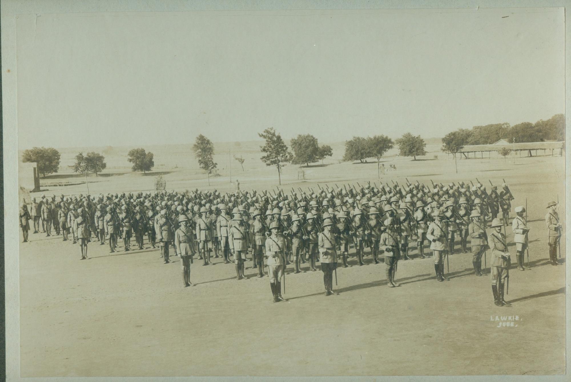 Group photograph of Ronald Rootham in india